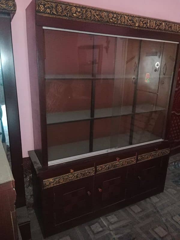 showcase with 3 drawers 3 cubet 3 realing glass door 1