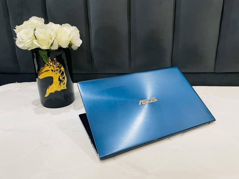 ASUS ZenBook 14 Ultra-Slim Laptop NanoEdge Bezel Dual ScreenPad. . 1