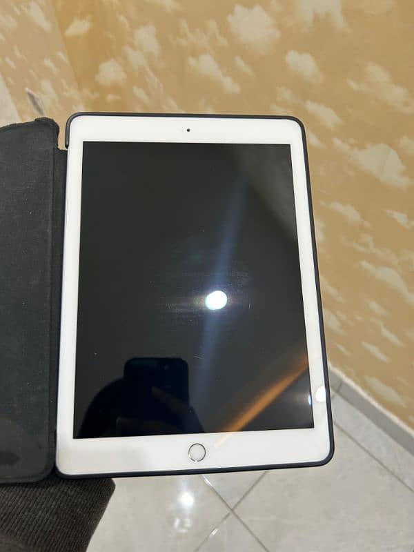 IPAD 6TH GENERATION FROM SHARJAH UAE 128 GB WITH COVER 15