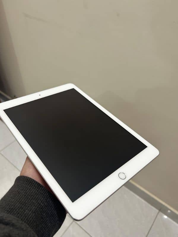 IPAD 6TH GENERATION FROM SHARJAH UAE 128 GB WITH COVER 18