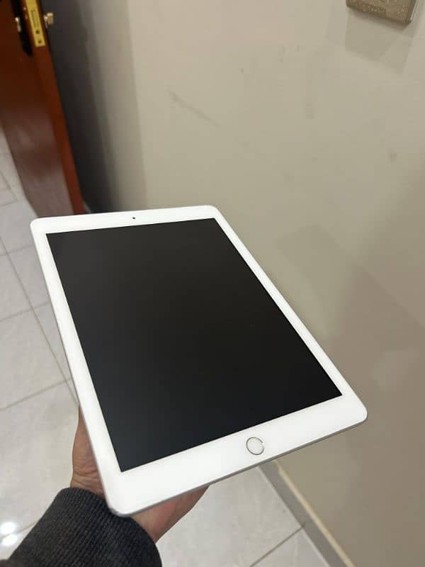 IPAD 6TH GENERATION FROM SHARJAH UAE 128 GB WITH COVER 19