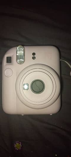 Instax mini 12 Polaroid camera without films