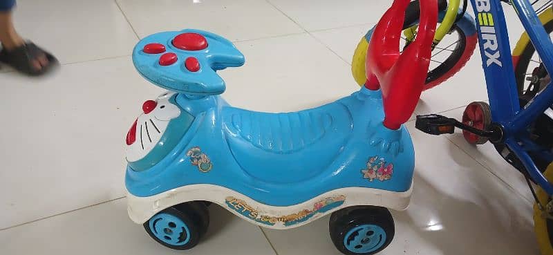 kids 4 wheel coozi car 1