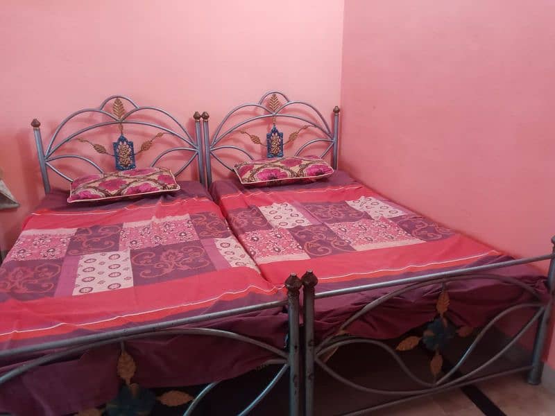 2 single iron beds 2