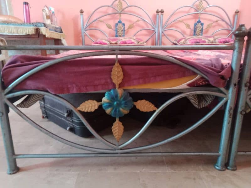 2 single iron beds 4