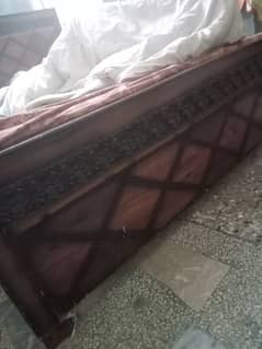 wooden bed hy. . . .