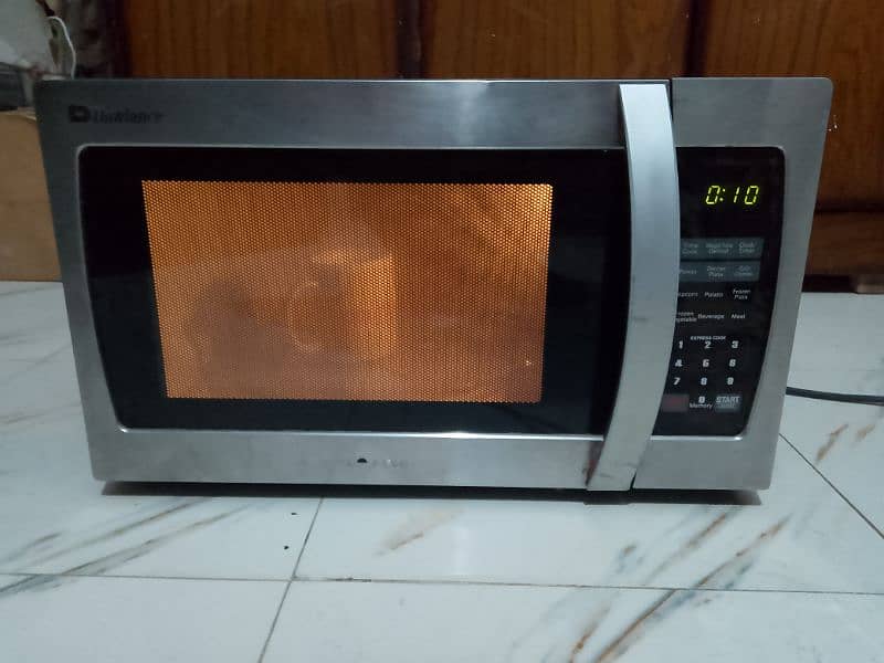 Dawlance 2 in 1 microwave oven cooking grill bhi Hote h 36 litter 2