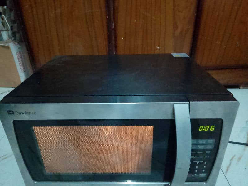 Dawlance 2 in 1 microwave oven cooking grill bhi Hote h 36 litter 3