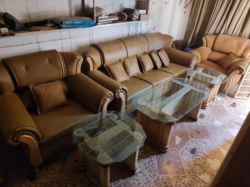 5 seater sofa 1 center table 2 small table glass waly 1