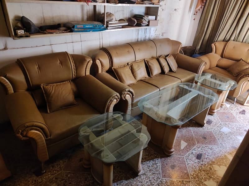 5 seater sofa 1 center table 2 small table glass waly 2