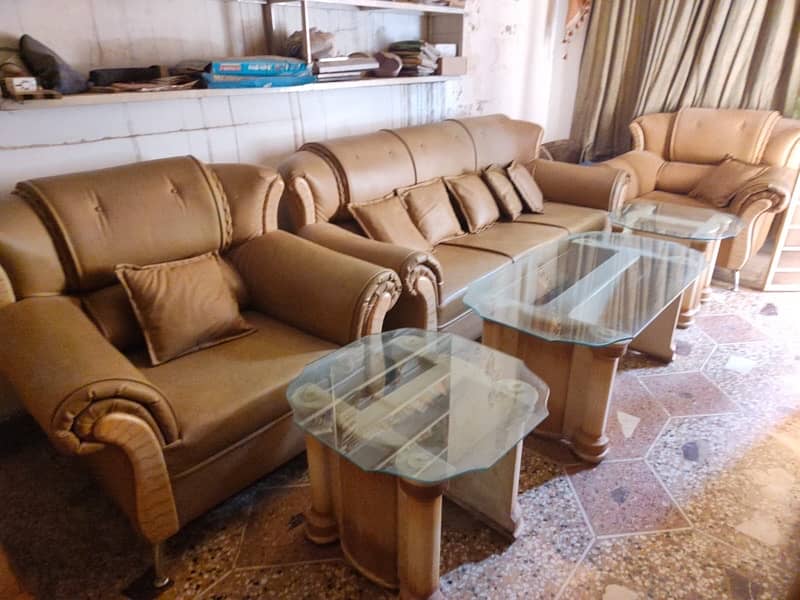 5 seater sofa 1 center table 2 small table glass waly 3