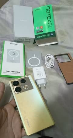 Infinix Note 40 Pro with All Box Adapter Cable and wireless Charger