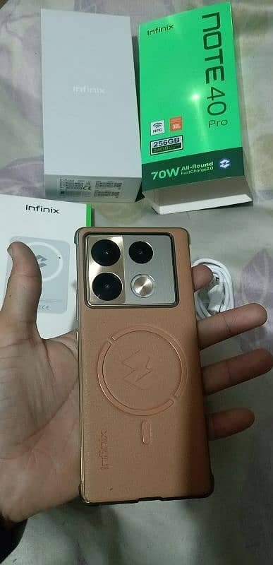 Infinix Note 40 Pro with All Box Adapter Cable and wireless Charger 2