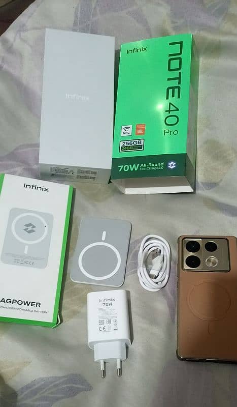 Infinix Note 40 Pro with All Box Adapter Cable and wireless Charger 4