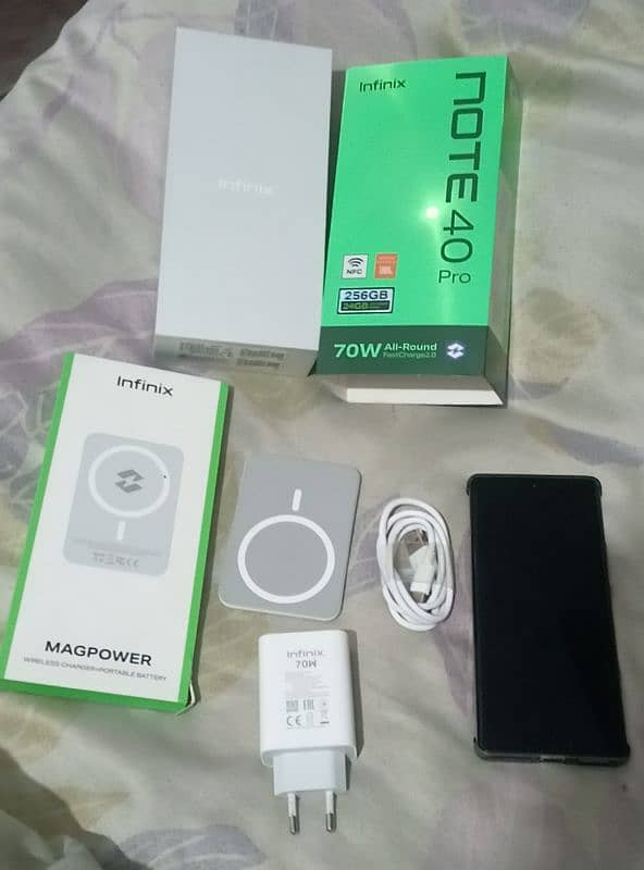 Infinix Note 40 Pro with All Box Adapter Cable and wireless Charger 5