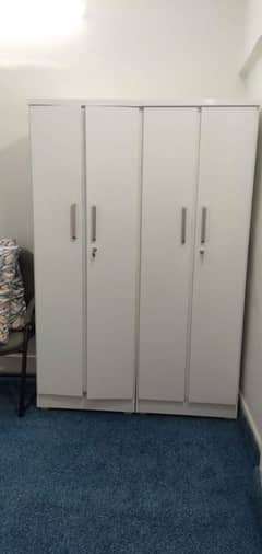 Single bed without mattress, double door cupboard