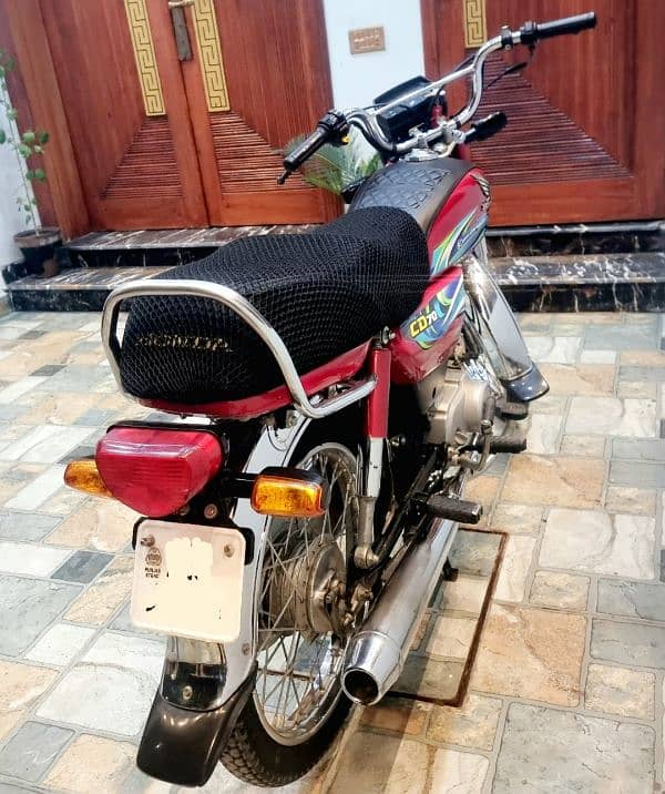 Honda CD 70 Red 2024 model 9