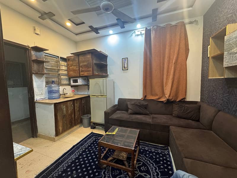 Fully Furnished 1-Bed lounge (Balcony)Apartment For Rent 1s Floor, Johar Town, 400 Sqft 2