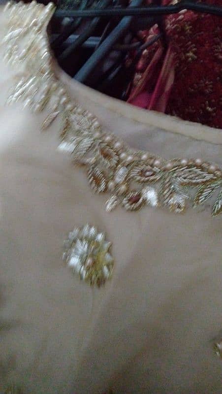 Dull gold boutique frock with sharara and organza dopatta 1
