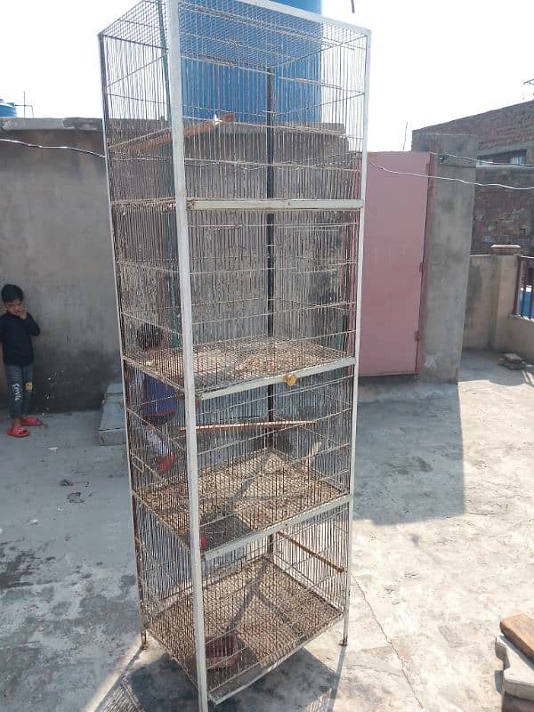 4 portion parrot cage 2 by 1.5 good condition 6