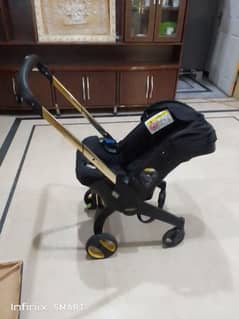 doona stoler 3 in one. cot+car seat+stoler