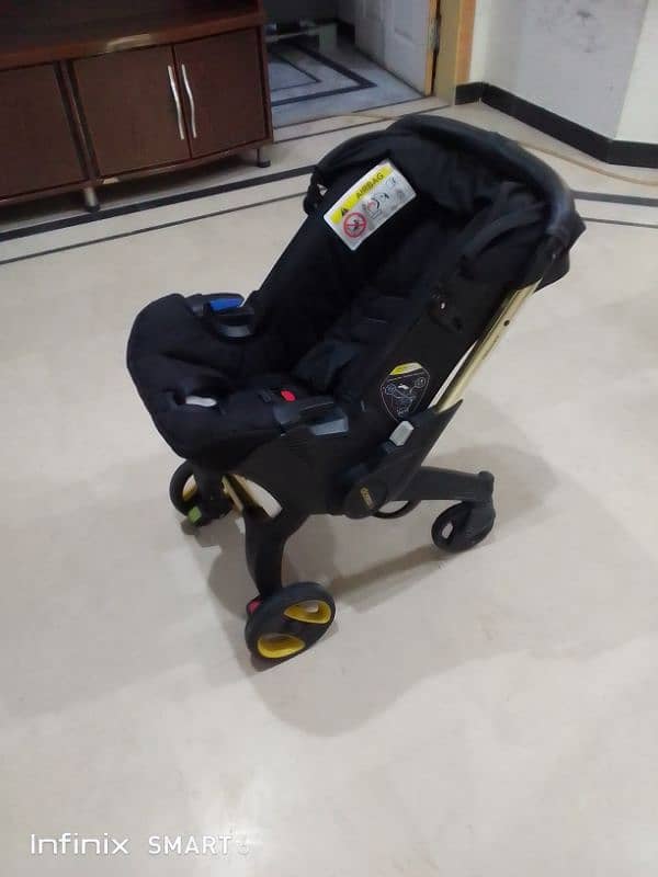 doona stoler 3 in one. cot+car seat+stoler 1