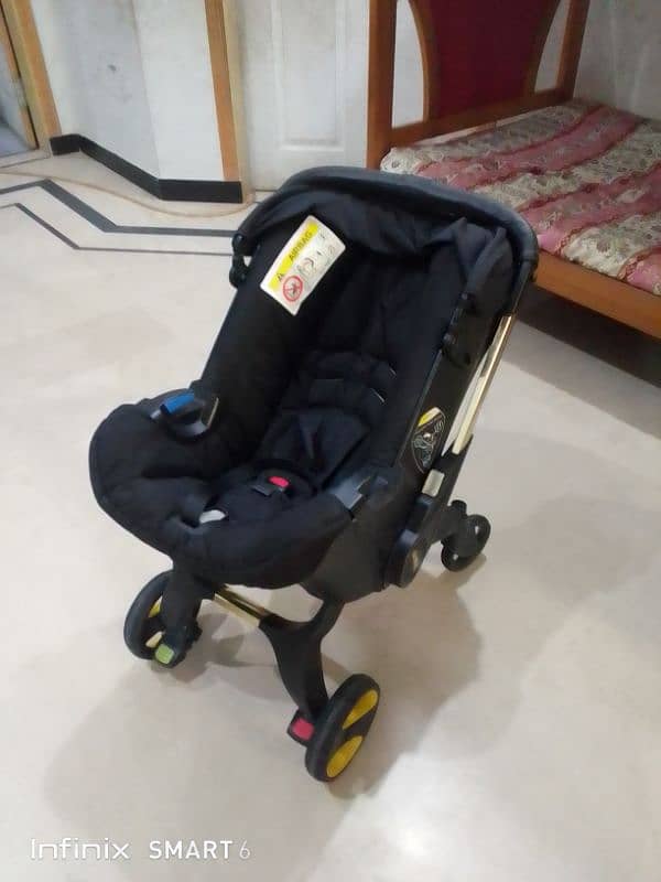 doona stoler 3 in one. cot+car seat+stoler 5