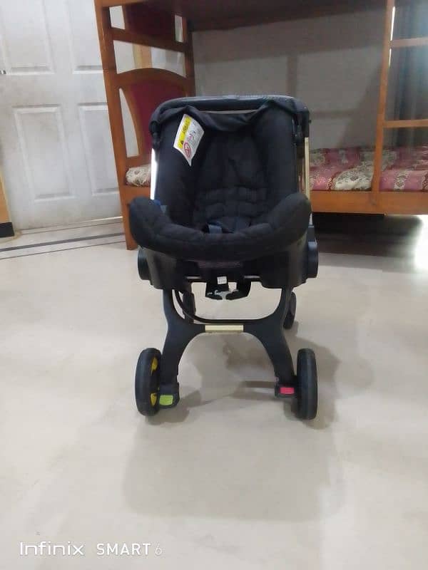 doona stoler 3 in one. cot+car seat+stoler 6