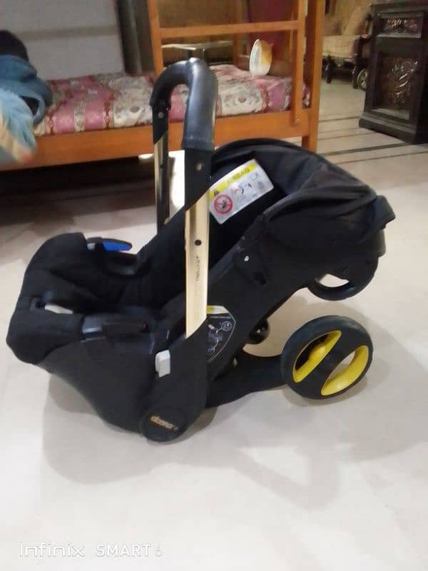 doona stoler 3 in one. cot+car seat+stoler 8