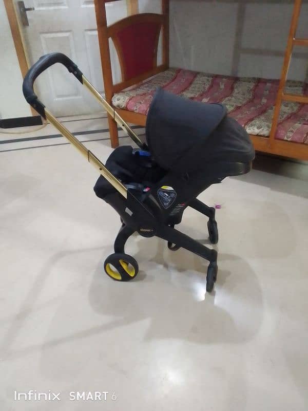 doona stoler 3 in one. cot+car seat+stoler 17