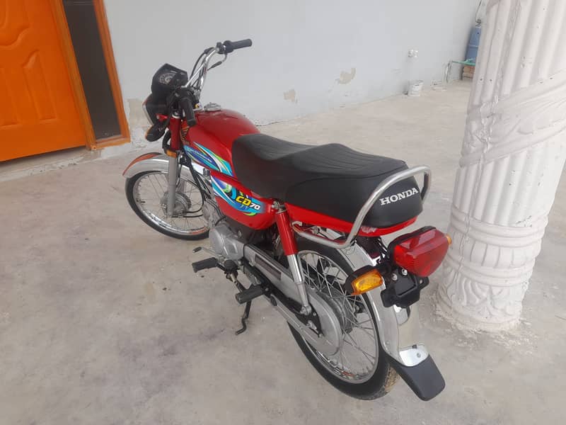 Honda CD 70 2024 4