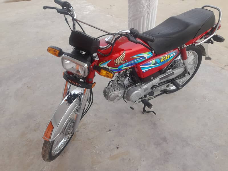 Honda CD 70 2024 5