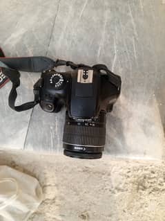 Dslr Canon camera with lens and charger