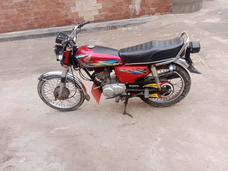 Honda 125 2018 faisalabad numbar 0