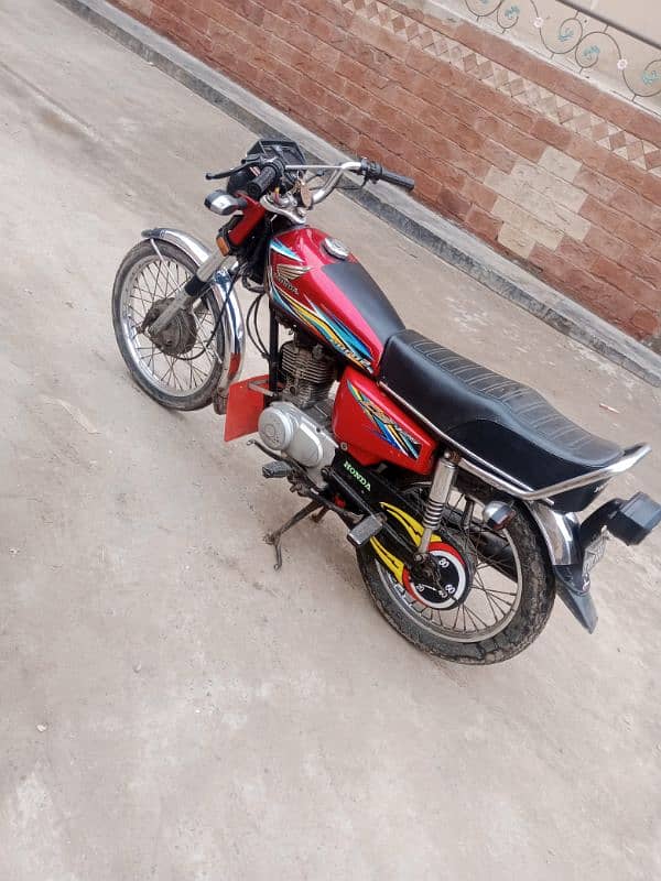 Honda 125 2018 faisalabad numbar 1