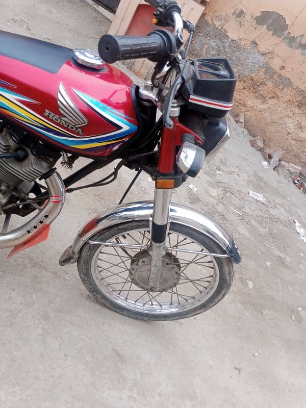 Honda 125 2018 faisalabad numbar 8