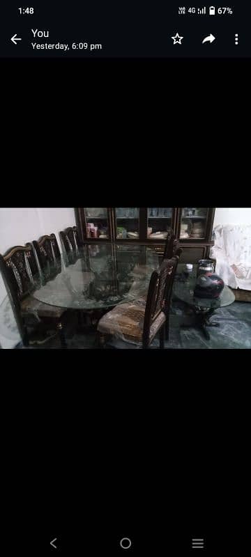 wooden dining table in lush condition 0