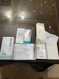 infinix zero 40 with 9months warranty just like box pack condition