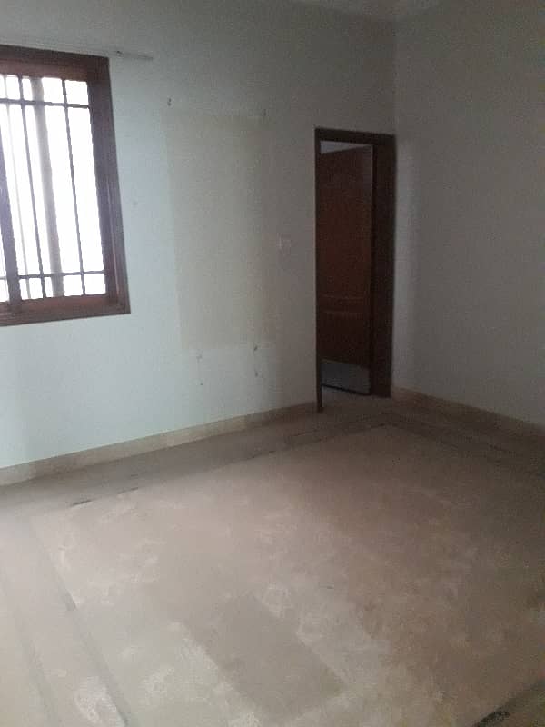 three bed dd first floor portion with roof for rent in johar 6