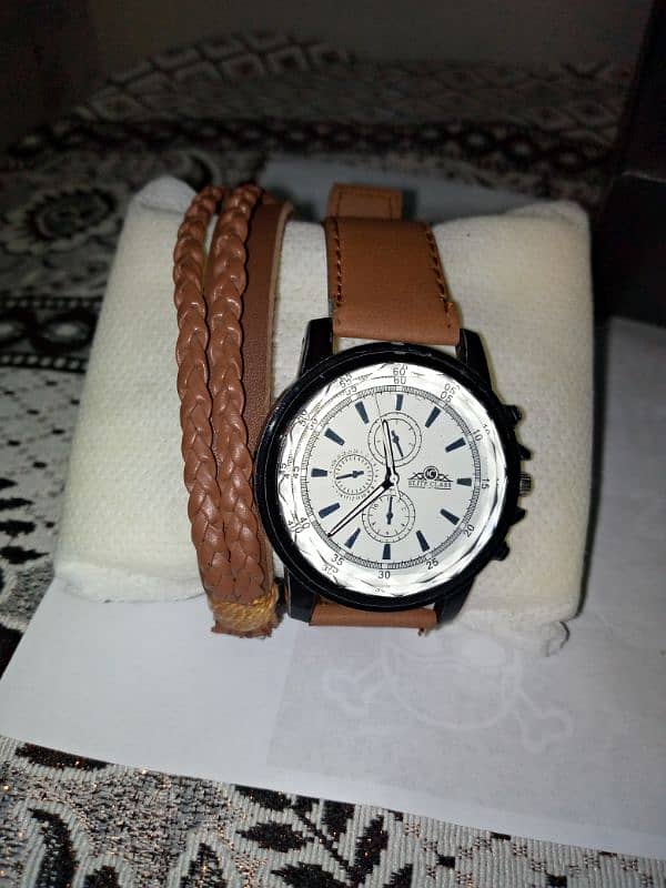 Light brown watch and hand bracelet for sale | box not included s 1