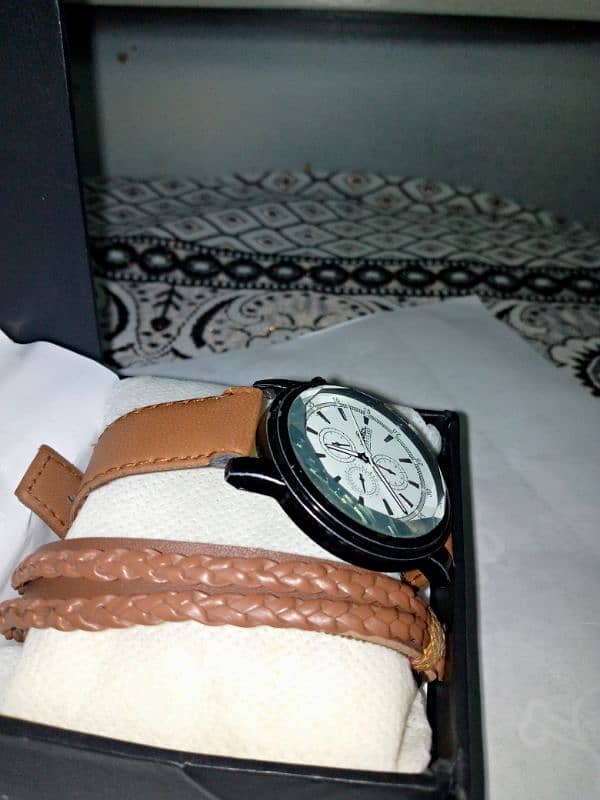 Light brown watch and hand bracelet for sale | box not included s 2