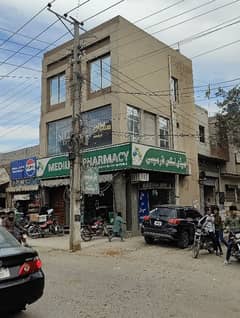 3 Story Corner Commercial Plaza Facing Canal Road Prime Location Ring Road SL3 ki only 1 Mint Drive 55 K se 65 k Rent Income Registery Intqal plaza