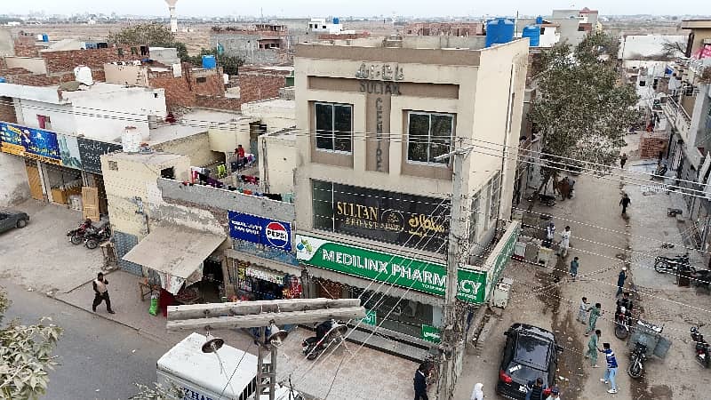 3 Story Corner Commercial Plaza Facing Canal Road Prime Location Ring Road SL3 ki only 1 Mint Drive 55 K se 65 k Rent Income Registery Intqal plaza 2