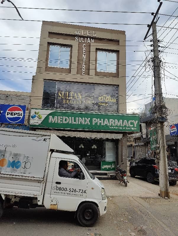 3 Story Corner Commercial Plaza Facing Canal Road Prime Location Ring Road SL3 ki only 1 Mint Drive 55 K se 65 k Rent Income Registery Intqal plaza 14