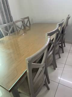 8 chairs and long dinning table