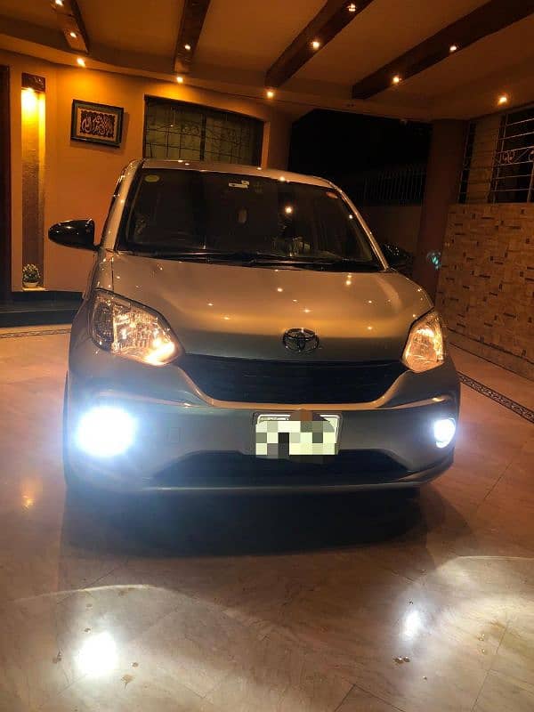 Toyota Passo 2018 4 grade auction sheet 1