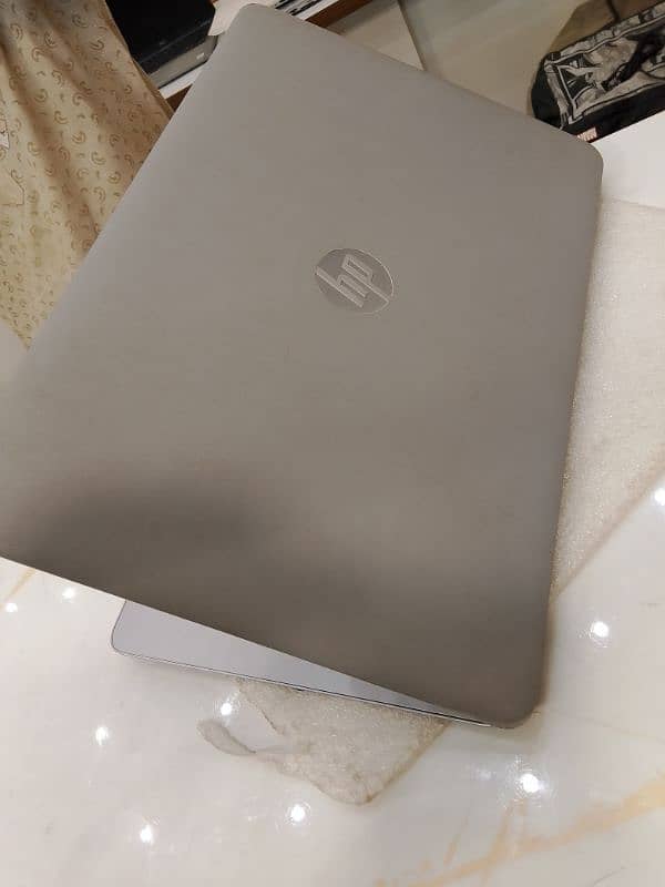 HP LAPTOP WITH ORIGINAL CHARGER 1