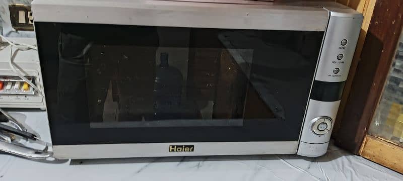 Gas/electric oven and microwave for sale in reasonable rates 1