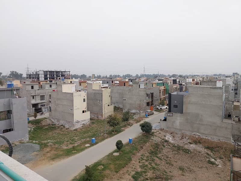 4 MARLA COMMERCIAL PLOT WITH POSSESION @ MAIN 150 FEET ROAD IN AL KABIR TOWN PHASE 2 BLOCK E 10