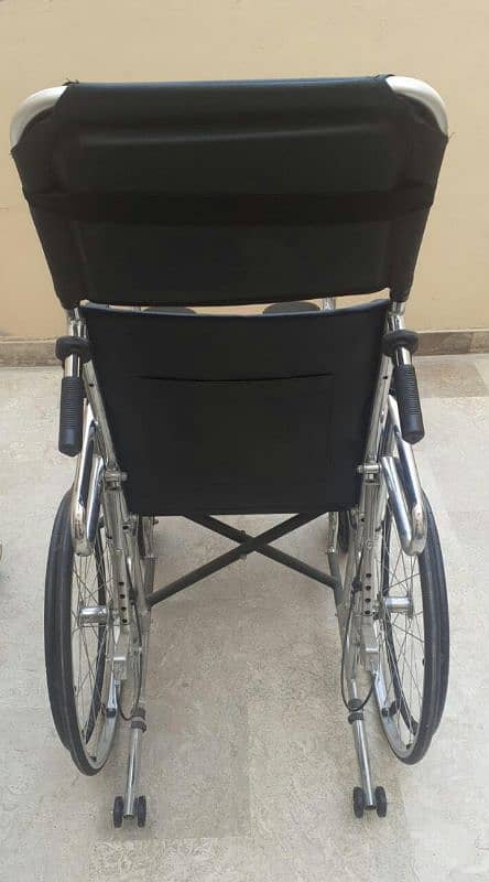 Folding Reclining Wheelchair with Commode Attachment 1